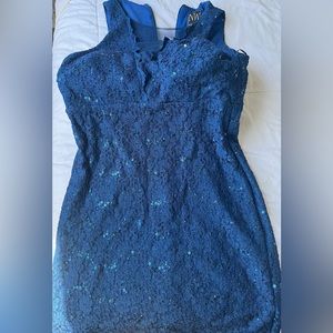 Sparking blue cocktail dress. Perfect for a wedding.